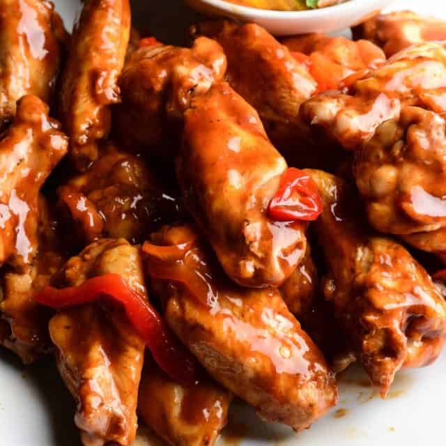 Chicken wings served spicy buffalo wing sauce