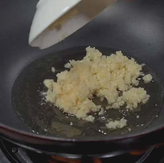 Saute chopped garlic until fragrant