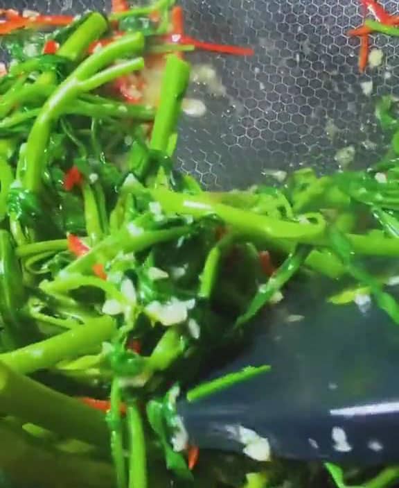 Stir fry quickly to maintain its vibrant green color